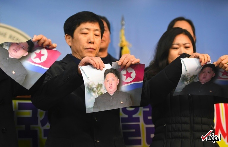 تصویری از پاره کردن عکس رهبر جنجالی کره شمالی در سئول