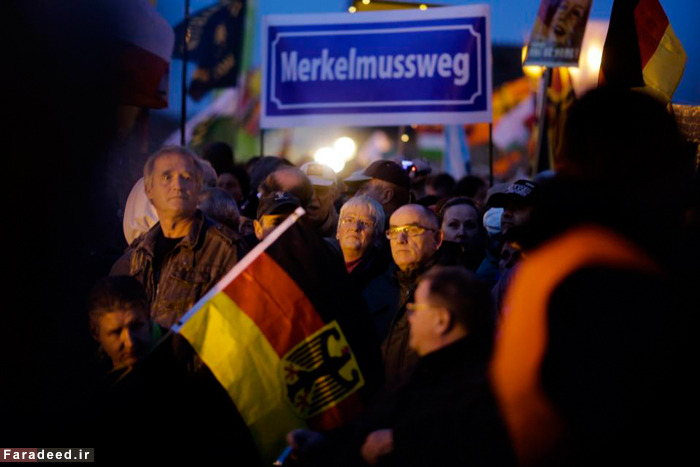 (تصاویر) راهپیمایی علیه مرکل و مهاجران